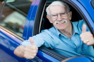 old man happy in a car that was a women getting in car for a Vehicle Donation