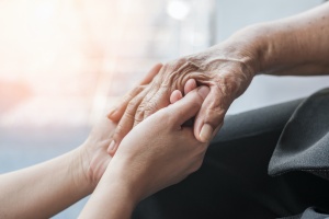 holding hands while working with Health Advocacy