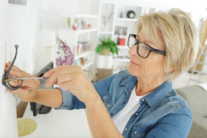 Senior Woman Doing Minor Home Repairs