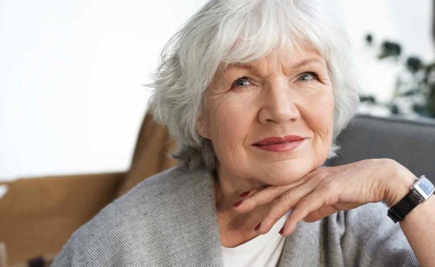 elderly woman on her couch Aging In Place