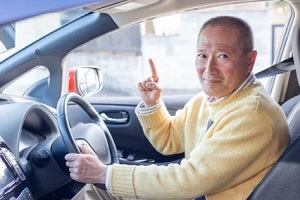 old man in car
