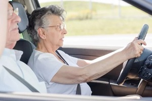 old women driving car