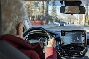old women driving in the car