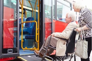 taking senior person to the bus