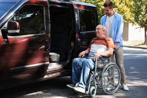 volunteer taking senior man to doctor appointment