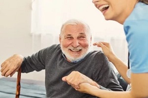 happy old man with nurse