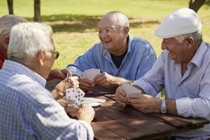 senior friends enjoying cards