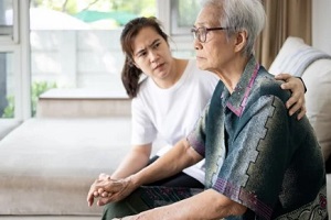 asian caregiver with old man in DC