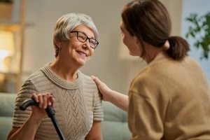 smiling old women with daughter