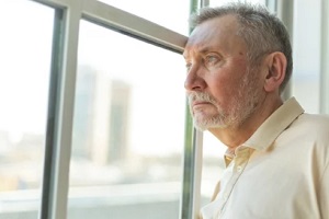 Northern Virginia old man looking out of window