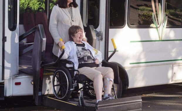 senior women in wheelchair lift
