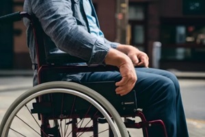 a senior man sitting on the wheelchair