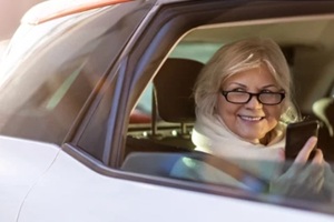 senior women travelling in a taxi