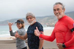 Elderly People Standing Near Each Other After Running Activity