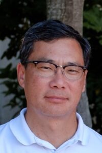 Photo of a SCNOVA volunteer named Charles Choi